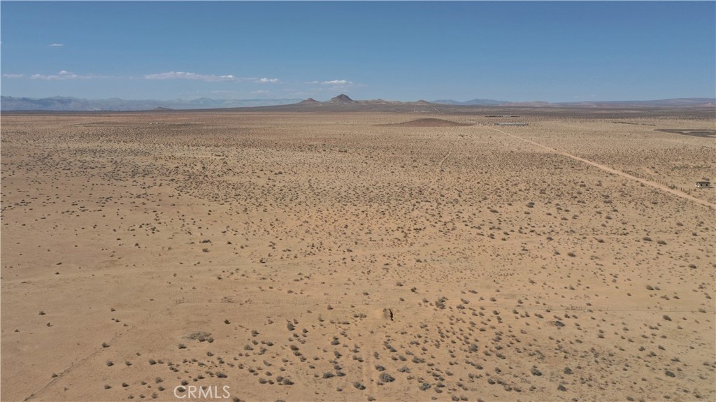 14637 Castle Butte Road North Edwards, CA 93523 - Photo 15 of 18 a view of an ocean beach and mountain