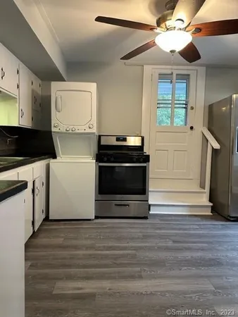 a kitchen with a stove and a microwave