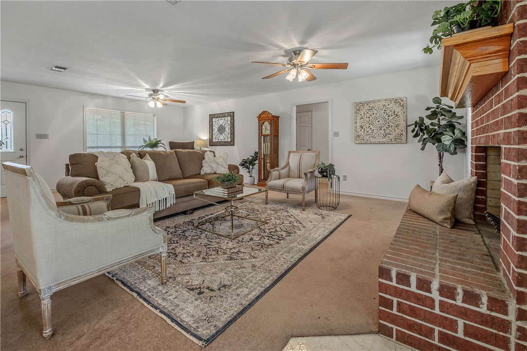 1110 County Road 439 Dime Box, TX 77853 - Photo 11 of 50 a living room with furniture and a chandelier