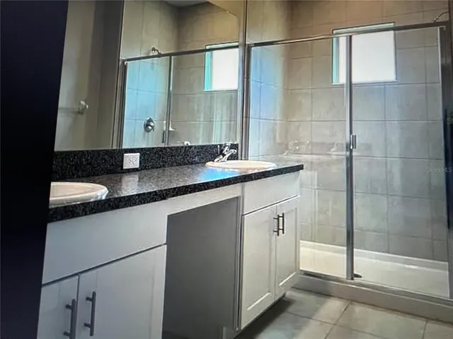 an empty room with closet area