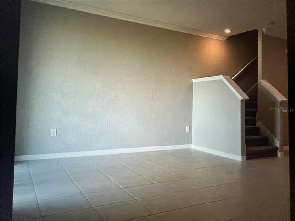 31611 Blue Passing Loop Wesley Chapel, FL 33545 - Photo 7 of 18 a view of an empty room