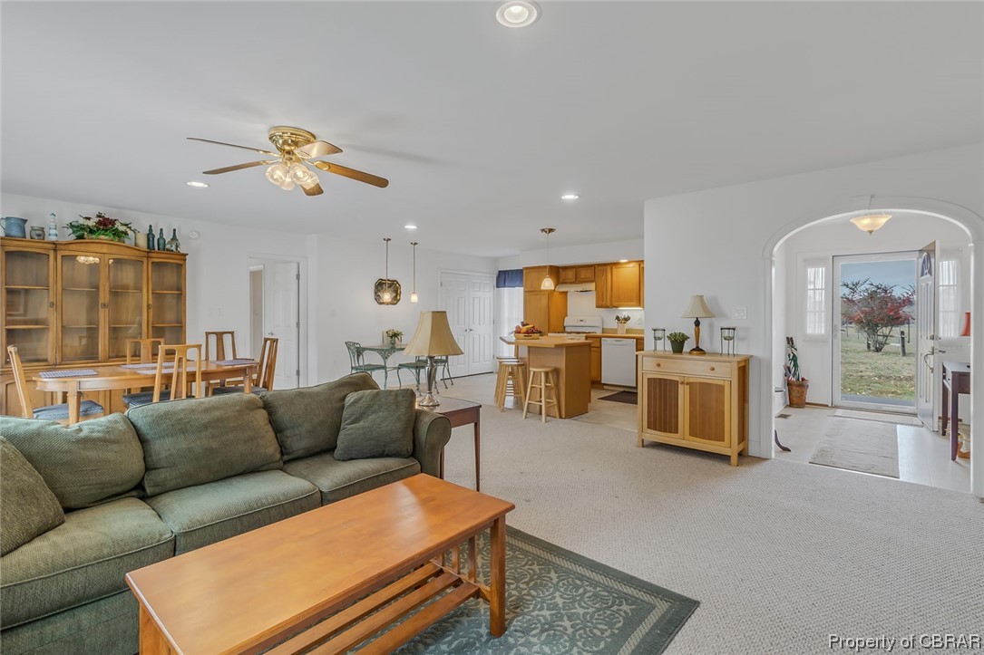 1243 Fox Point Road Reedville, VA 22539 - Photo 28 of 44 Living room featuring ceiling fan and light colored carpet