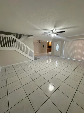 a view of a livingroom with furniture