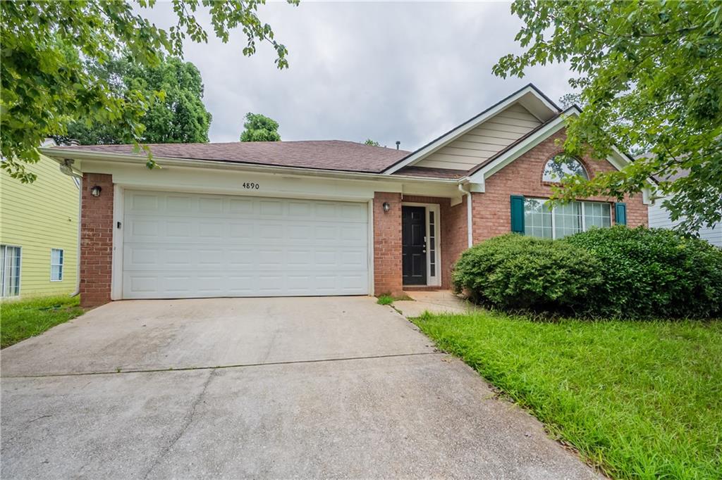 4890 Wilkins Station Drive Decatur, GA 30035 - Photo 1 of 34 a view of outdoor space and yard