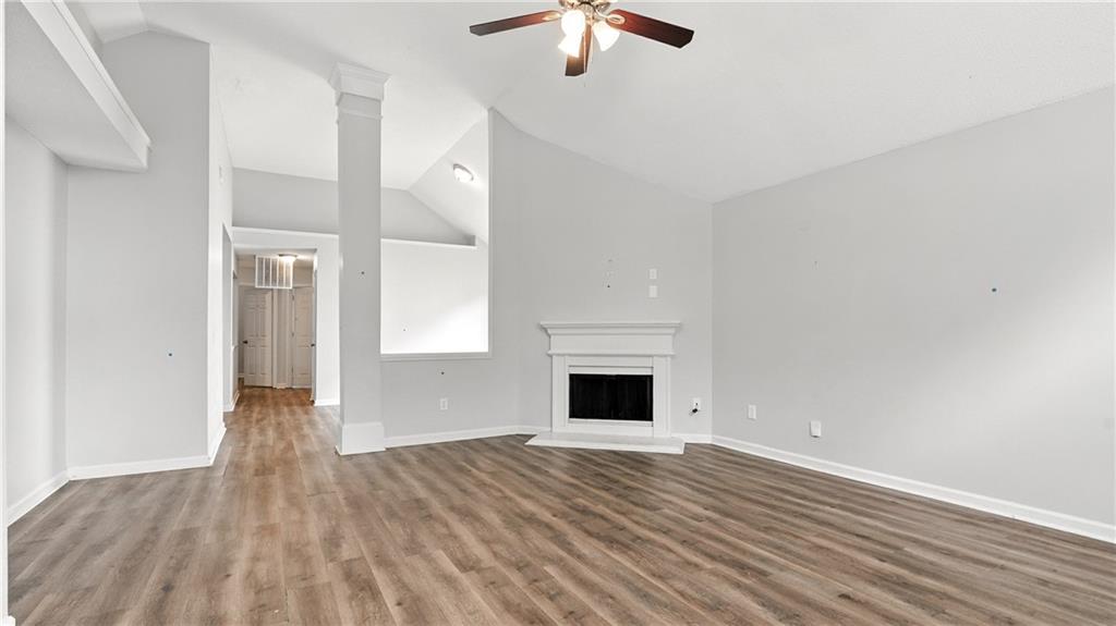 4890 Wilkins Station Drive Decatur, GA 30035 - Photo 11 of 34 a view of empty room with wooden floor and fan
