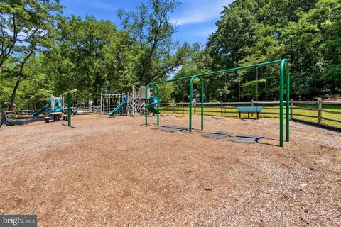 a view of a park with swings