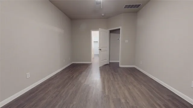 a bathroom with a bathtub and a toilet