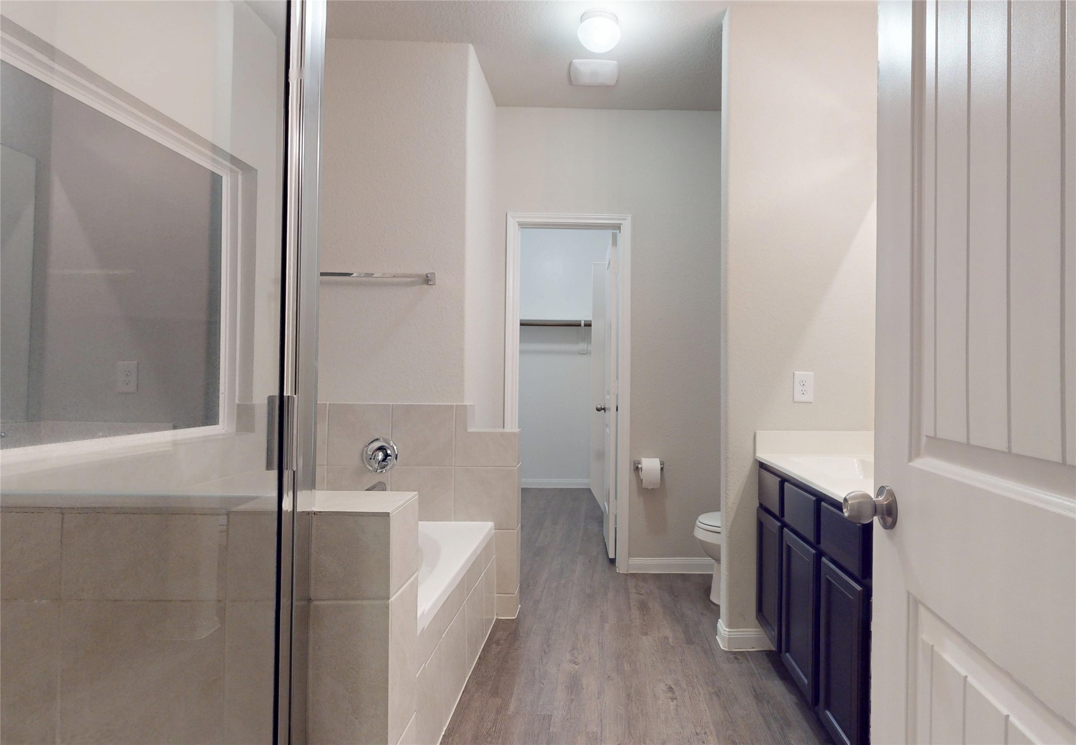 3535 Cannon Drive Conroe, TX 77301 - Photo 16 of 49 a bathroom with a bathtub and a toilet