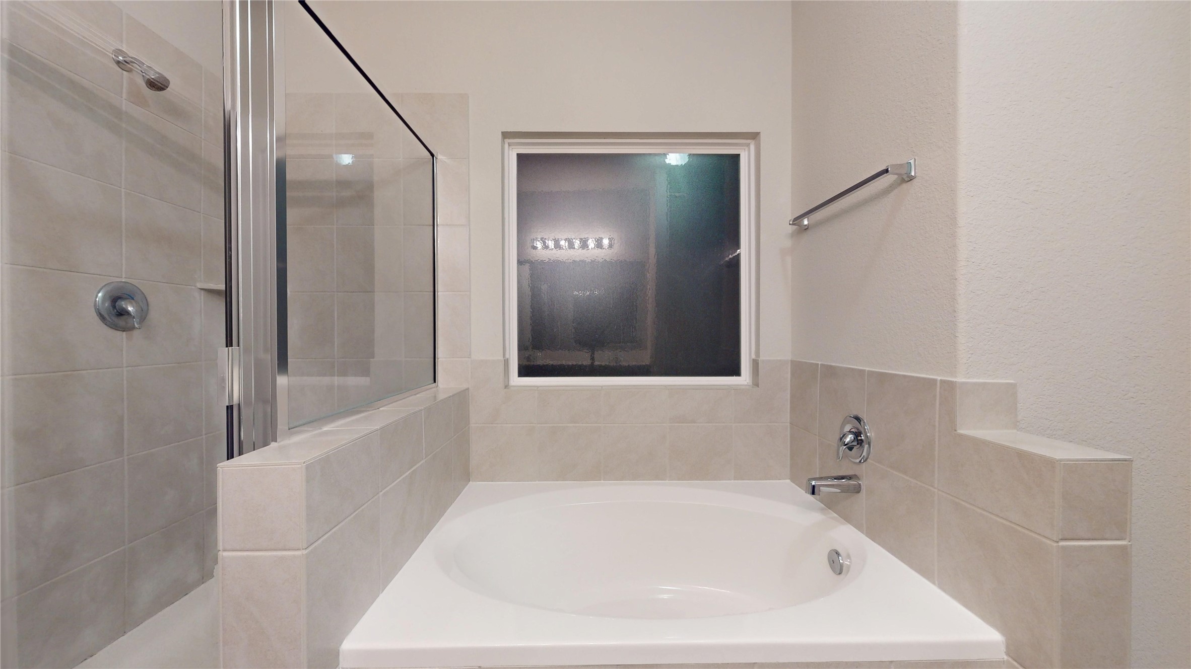 3535 Cannon Drive Conroe, TX 77301 - Photo 18 of 49 a white bath tub sitting in a bathroom and mirror