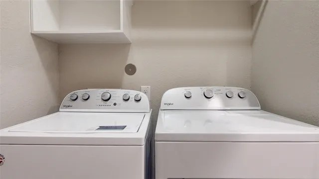 an aerial view of a house with a floor to ceiling window