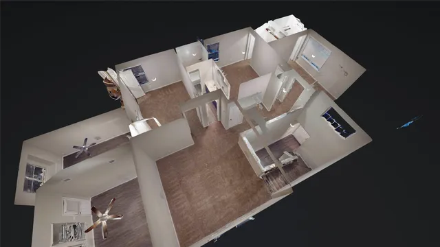 a bedroom with furniture and a window