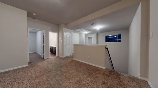 a spacious bathroom with a double vanity sink a mirror and a bathtub