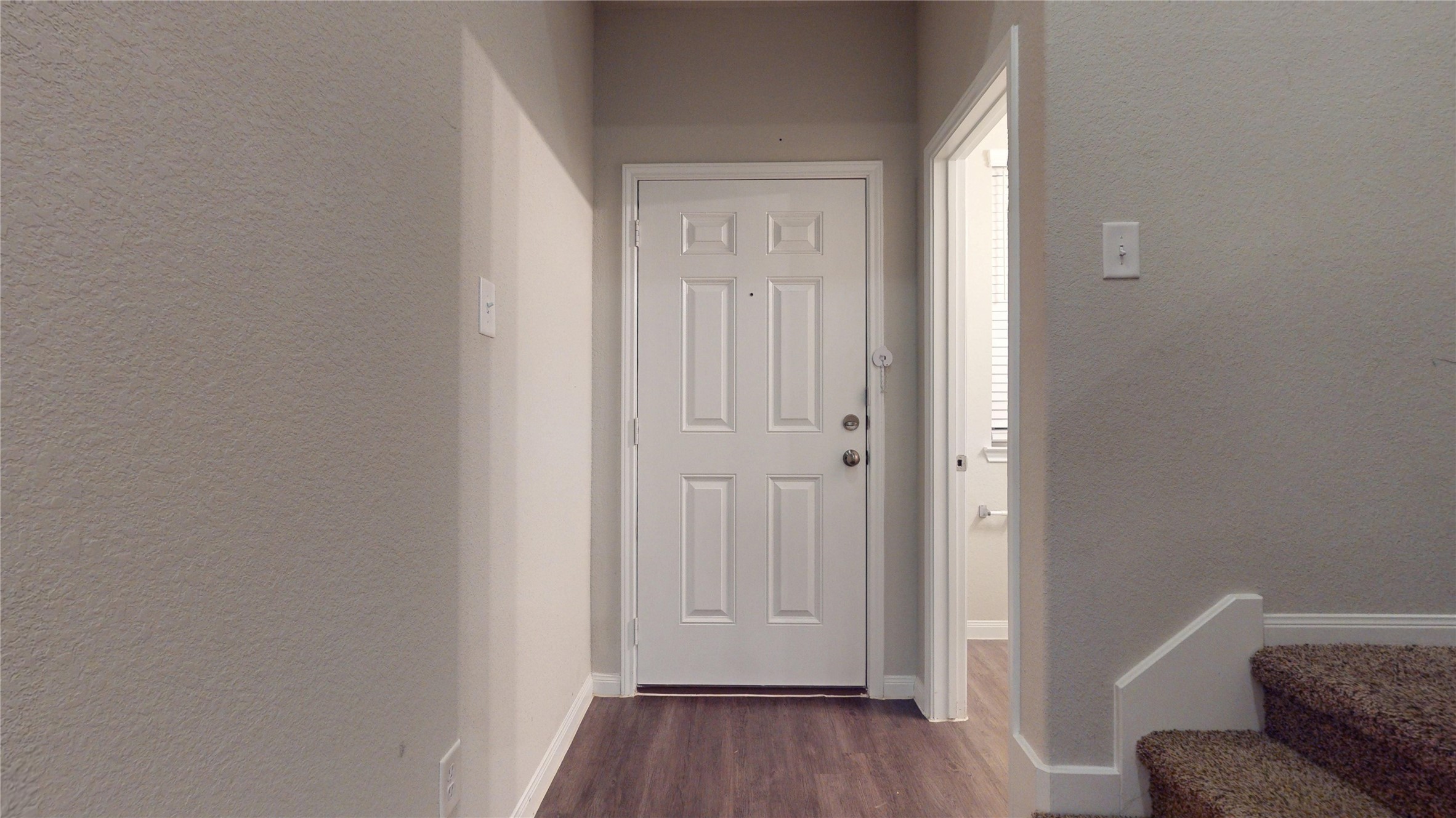 3535 Cannon Drive Conroe, TX 77301 - Photo 3 of 49 a view of hallway with furniture and wooden floor