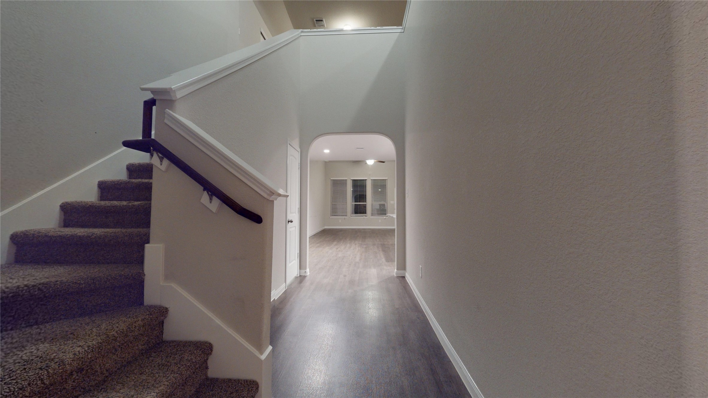 3535 Cannon Drive Conroe, TX 77301 - Photo 5 of 49 a view of a hallway with entryway and wooden floor