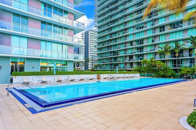 a view of swimming pool from a balcony