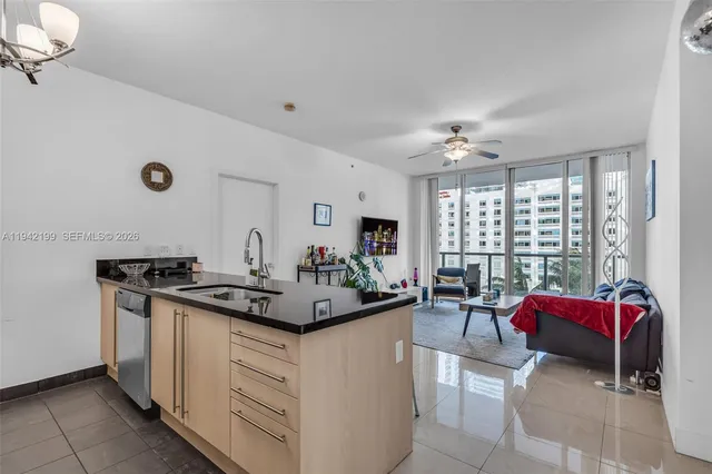 a view of living room with furniture and window