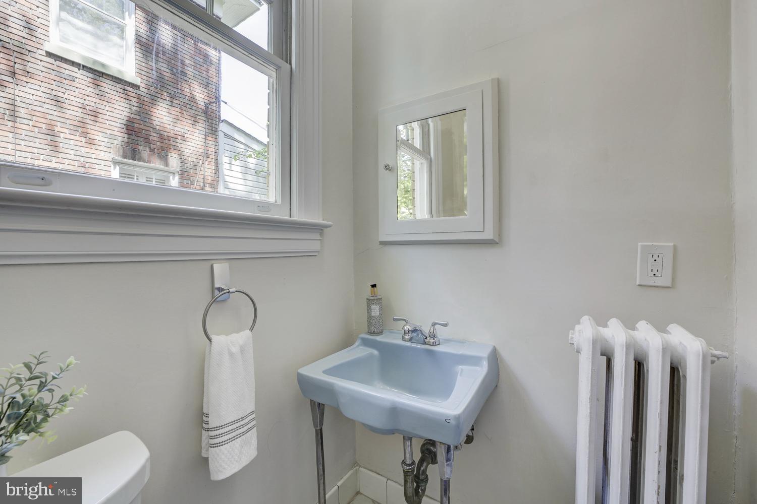 5533 33rd Street Northwest Washington, DC 20015 - Photo 19 of 47 Powder blue sink puts the powder in powder room!