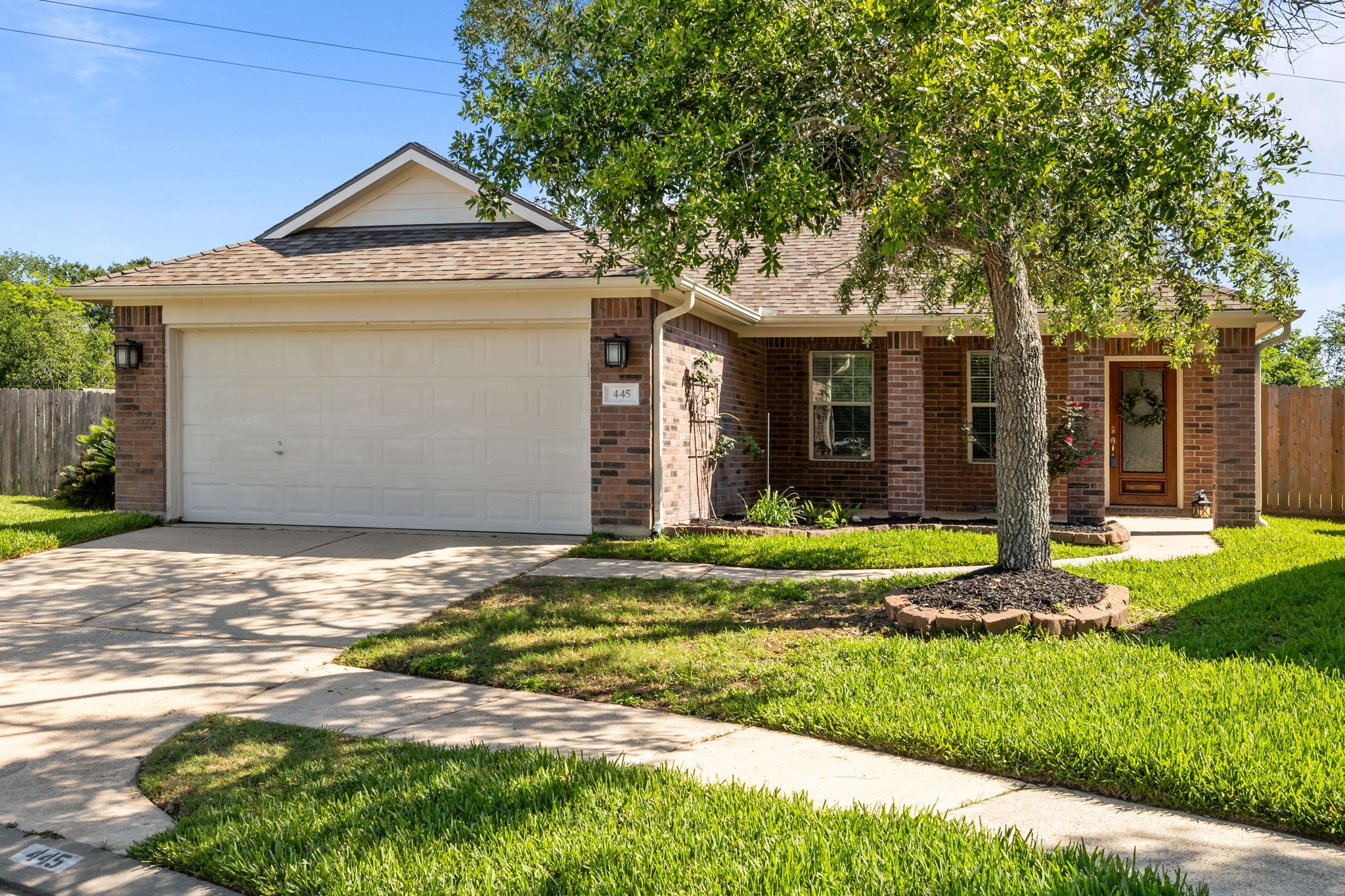 445 Decoster Boulevard Alvin, TX 77511 - Photo 2 of 32 Brick on all 4 sides of this home and roof replaced in 2024!