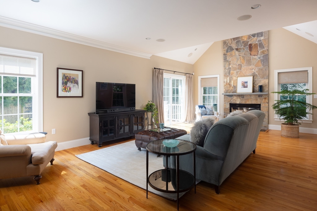 5 Peachtree Road Lexington, MA 02420 - Photo 4 of 18 a living room with furniture and a flat screen tv