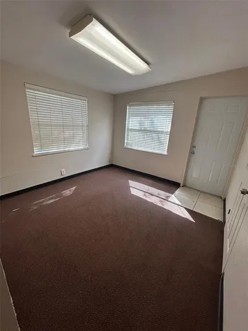 an empty room with windows