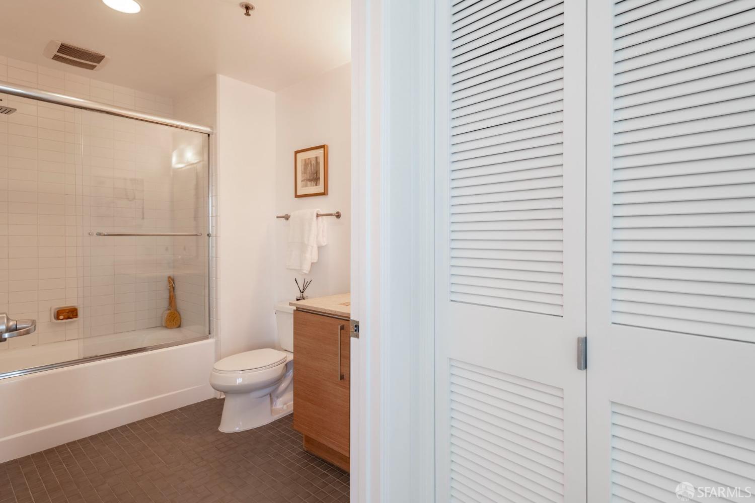 200 2nd Street, Unit 503 Oakland, CA 94607 - Photo 16 of 24 a bathroom with a toilet and a shower