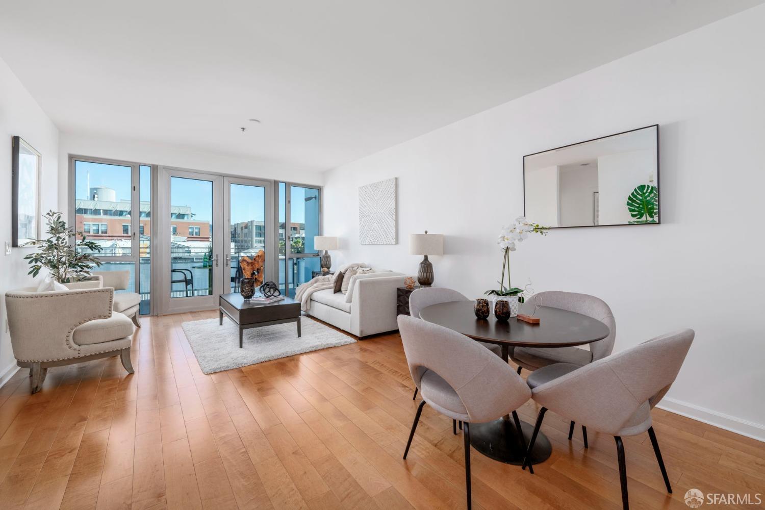 200 2nd Street, Unit 503 Oakland, CA 94607 - Photo 22 of 24 a living room with furniture and a wooden floor