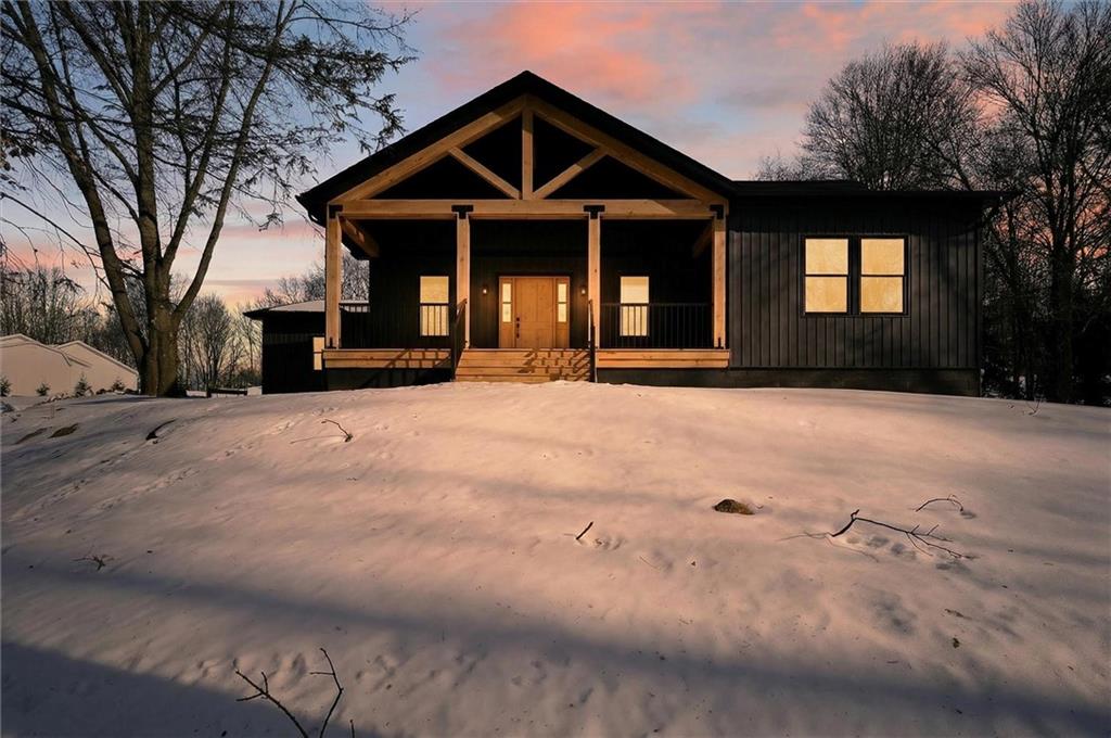 392 Stuber Road Beaver Falls, PA 15010 - Photo 1 of 48 a front view of a house with yard and trees in the background