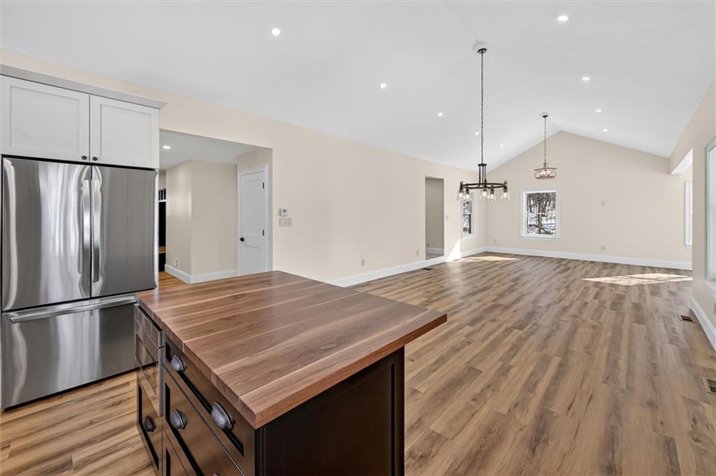 392 Stuber Road Beaver Falls, PA 15010 - Photo 16 of 48 a kitchen with a table and refrigerator