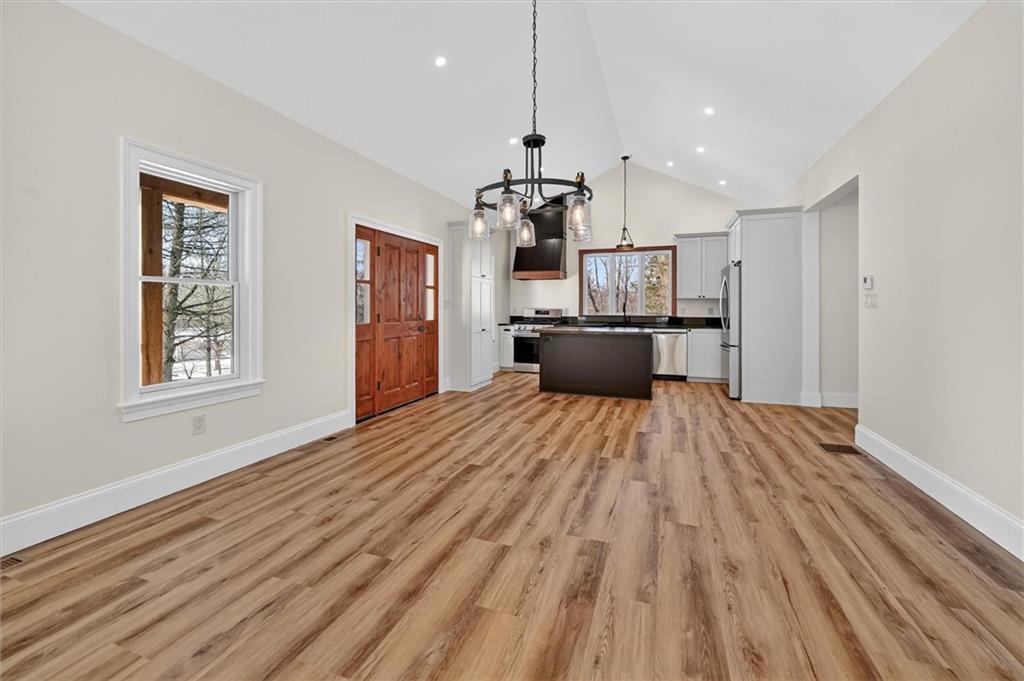 392 Stuber Road Beaver Falls, PA 15010 - Photo 19 of 48 a view of kitchen with wooden floor electronic appliances and window