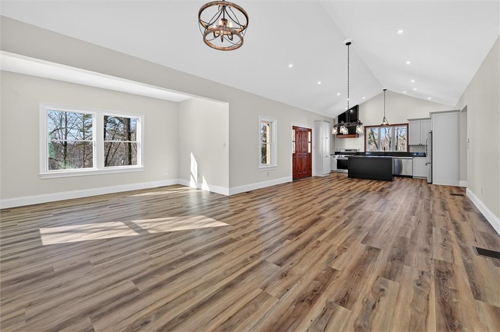 392 Stuber Road Beaver Falls, PA 15010 - Photo 20 of 48 a view of a kitchen with a stove cabinets and wooden floor
