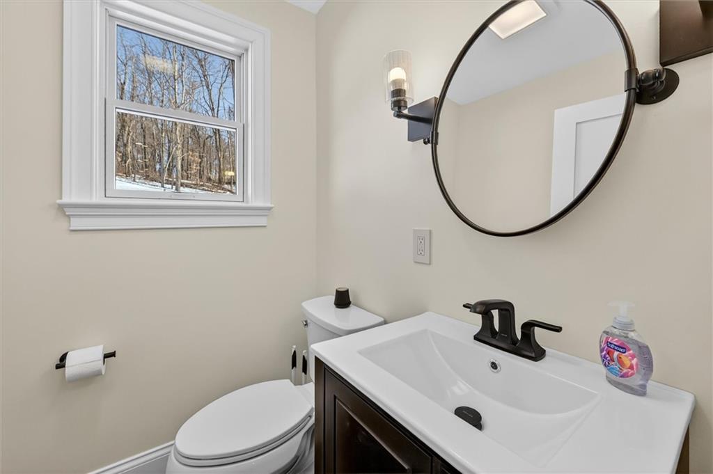392 Stuber Road Beaver Falls, PA 15010 - Photo 21 of 48 a bathroom with a sink and a mirror