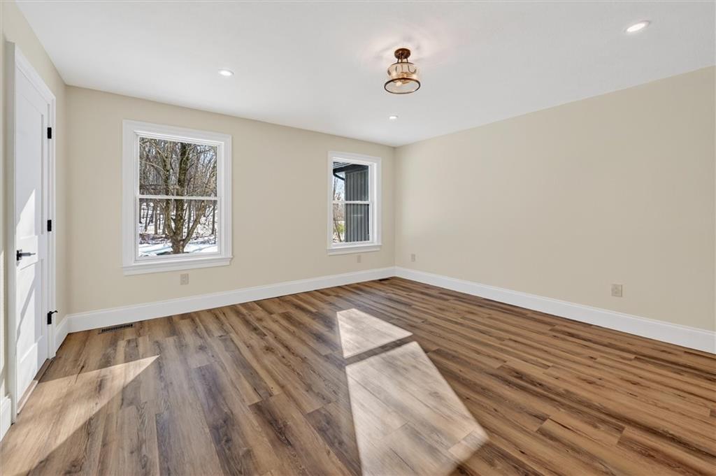 392 Stuber Road Beaver Falls, PA 15010 - Photo 22 of 48 a view of empty room with wooden floor and fan