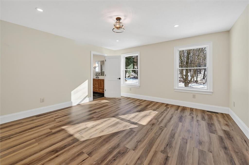 392 Stuber Road Beaver Falls, PA 15010 - Photo 23 of 48 a view of empty room with wooden floor and fan