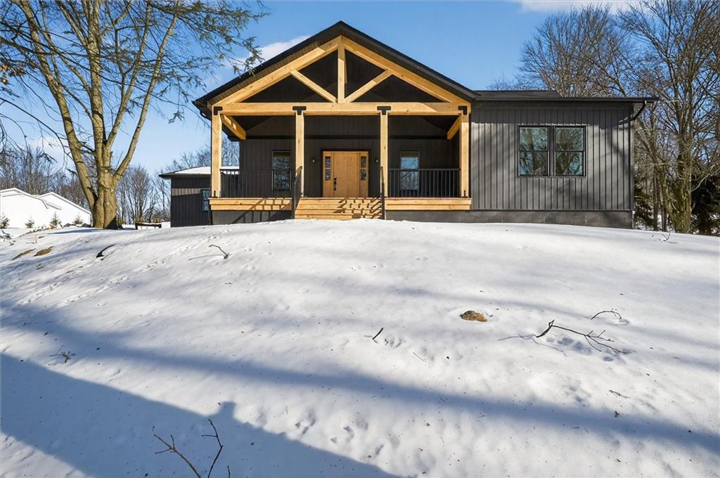 392 Stuber Road Beaver Falls, PA 15010 - Photo 3 of 48 a front view of a house with yard