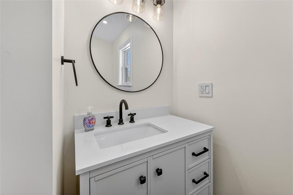 392 Stuber Road Beaver Falls, PA 15010 - Photo 33 of 48 a bathroom with a sink and a mirror