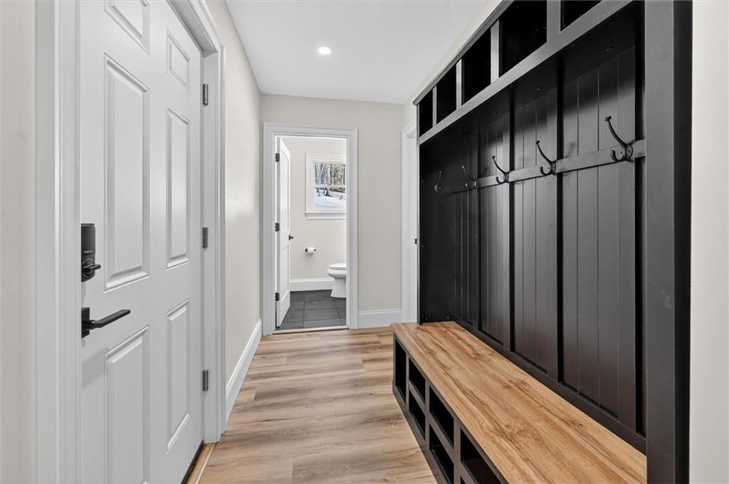 392 Stuber Road Beaver Falls, PA 15010 - Photo 35 of 48 a view of a hallway with wooden floor and staircase