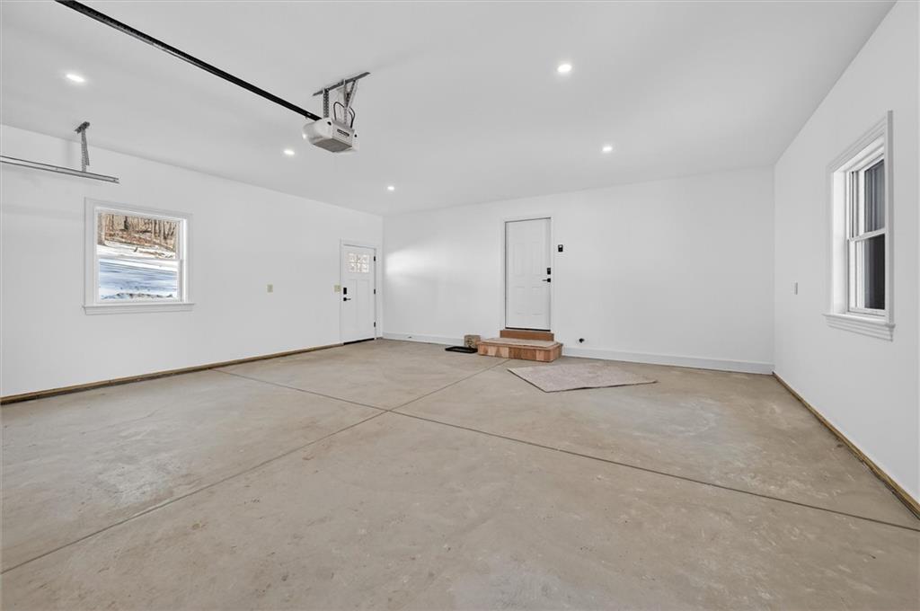 392 Stuber Road Beaver Falls, PA 15010 - Photo 40 of 48 an empty room with windows and ceiling fan