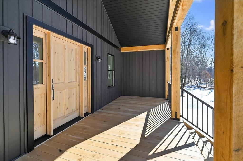 392 Stuber Road Beaver Falls, PA 15010 - Photo 7 of 48 a bedroom with a bed and wooden floor