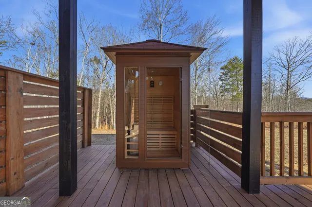 a view of outdoor space with wooden floor and entrance