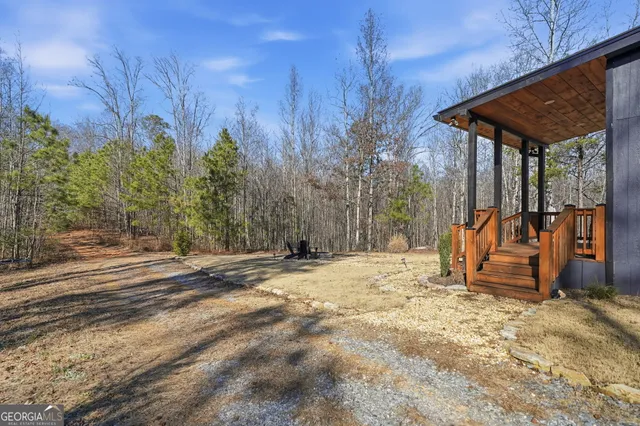 a view of a yard with an trees
