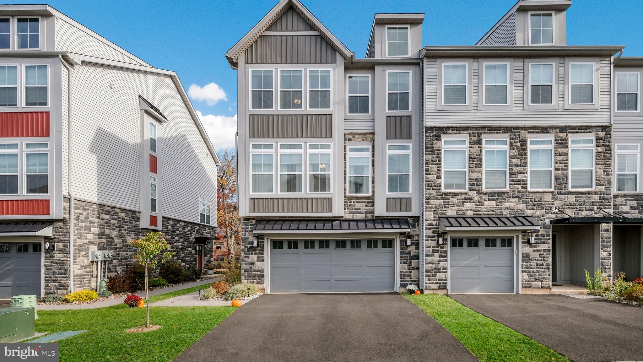 a front view of building with yard