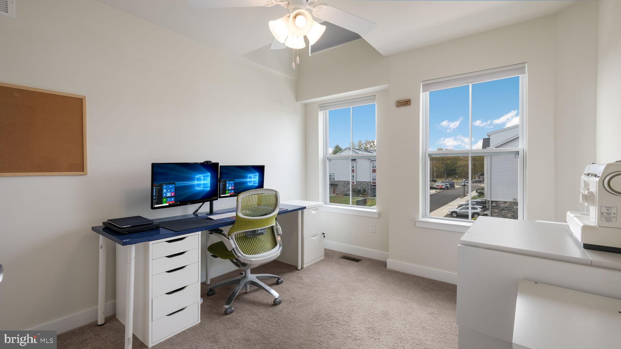 42 Independence Court Perkasie, PA 18944 - Photo 20 of 23 a view of a workspace with furniture and a window