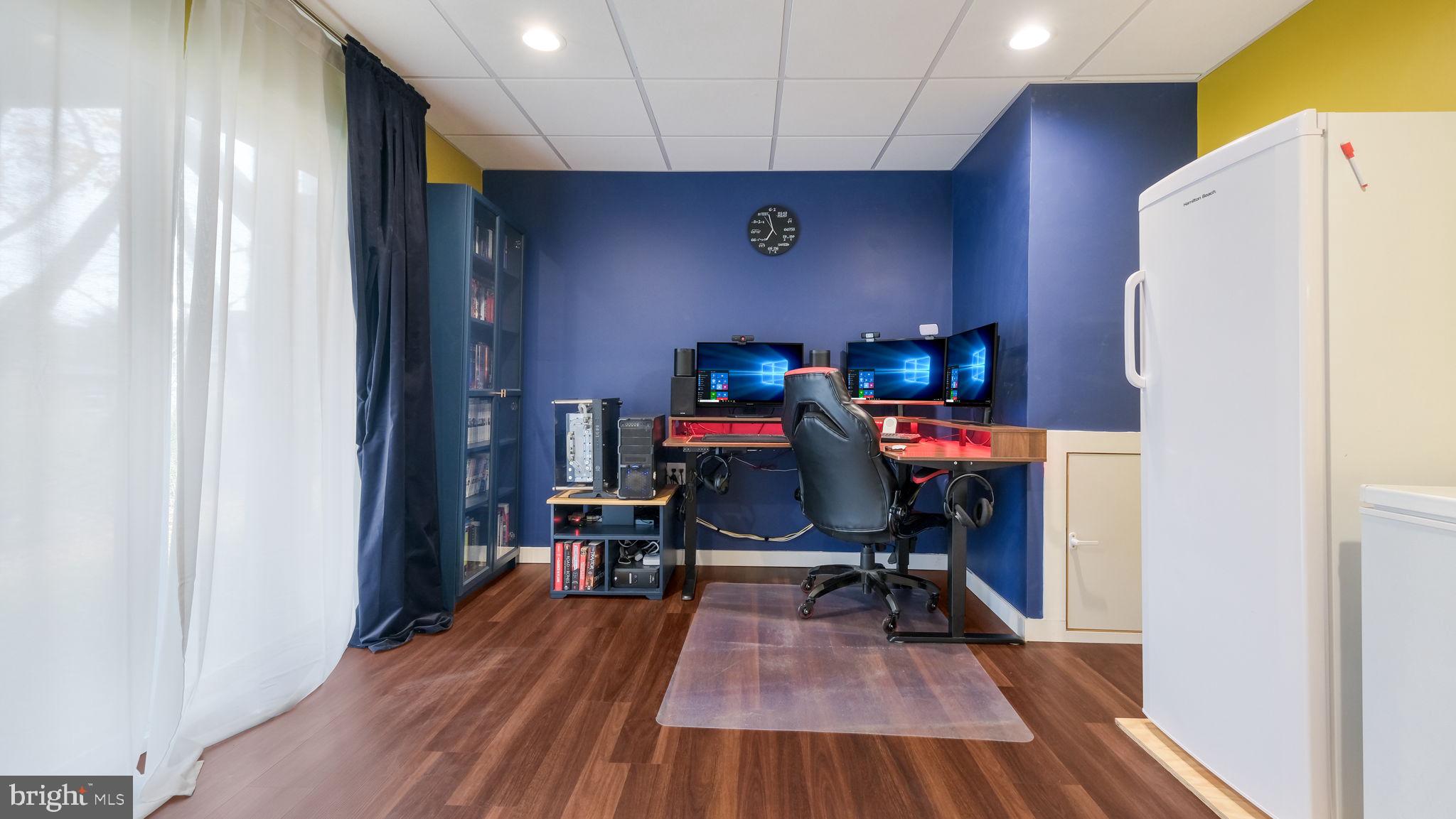 42 Independence Court Perkasie, PA 18944 - Photo 4 of 23 a view of a workspace with furniture and wooden floor