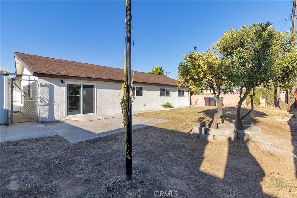3306 Debbie Lane Riverside, CA 92501 - Photo 26 of 32 a front view of a house with a yard