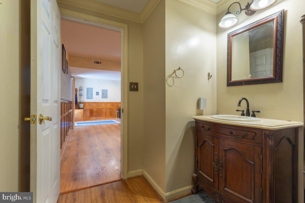 2113 Courthouse Road Catlett, VA 20119 - Photo 22 of 36 a en suite bathroom with a sink mirror and vanity