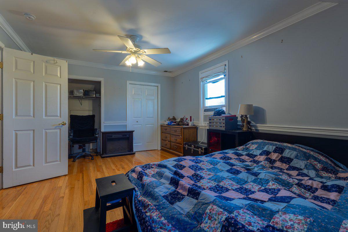 2113 Courthouse Road Catlett, VA 20119 - Photo 29 of 36 a bedroom with furniture and a wooden floor
