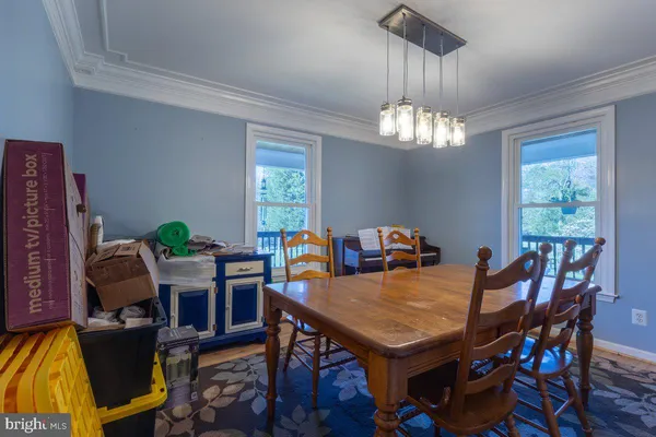 a view of a floor to ceiling window with wooden floor
