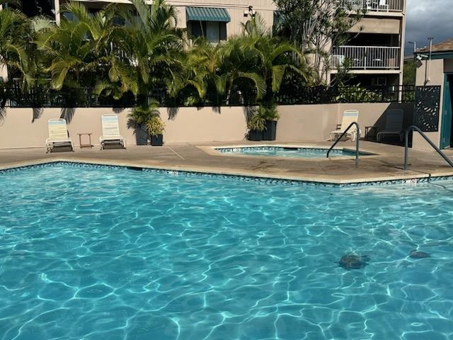 2219 South Kihei Road, Unit B402 Kihei, HI 96753 - Photo 4 of 5 a view of a house with a yard