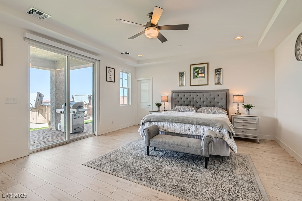 130 West Fairway Road Henderson, NV 89015 - Photo 15 of 40 Bedroom featuring light wood finished floors, access to exterior, ceiling fan, and recessed lighting