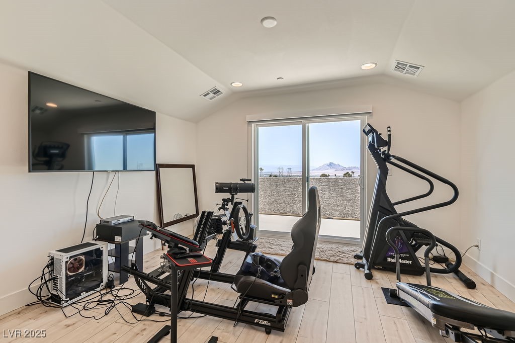 130 West Fairway Road Henderson, NV 89015 - Photo 28 of 40 Workout area featuring recessed lighting, light wood finished floors, lofted ceiling, and a mountain view